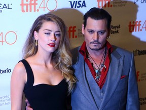 Johnny Depp and Amber Heard on the red carpet for Black Mass, Monday, Sept. 14. Dave Abel/Postmedia Network