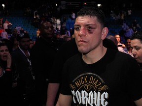Nick Diaz was suspended for five years by the Nevada State Athletic Commission on Monday for testing positive for marijuana for a third time. (Steve Marcus/Getty Images/AFP)