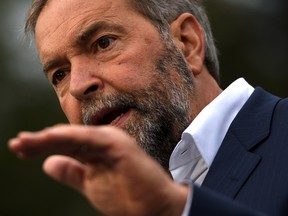 NDP Leader Tom Mulcair gestures while he speaks to supporters during a campaign stop in Cranbrook, B.C., on Monday, Sept. 14, 2015. THE CANADIAN PRESS/Sean Kilpatrick