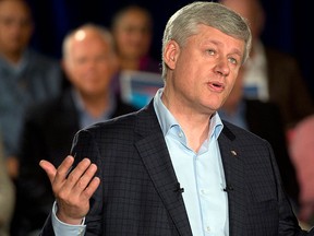 Conservative leader Stephen Harper speaks to supporters while campaigning Tuesday, Sept. 15, 2015  in North Vancouver. THE CANADIAN PRESS/Ryan Remiorz