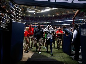 Running back Marshawn Lynch #24 of the Seattle Seahawks walks off the field at the end of the first half during the game against the St. Louis Rams at Edward Jones Dome on September 13, 2015 in St Louis, Missouri.   Jamie Squire/Getty Images/AFP