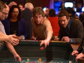 Ben Mendelsohn, middle, and Ryan Reynolds, right, star in "Mississippi Grind."