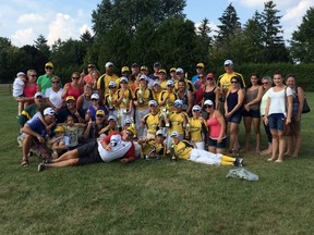 The Sudbury Shamrocks Mosquito team pose with their families and the provincial championship trophy last week.