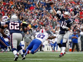 New England Patriots quarterback Tom Brady throws a pass against the Buffalo Bills in the first quarter at Gillette Stadium in Foxboro, Mass., on Dec. 28, 2014. (David Butler II/USA TODAY Sports)