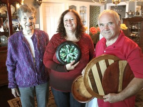 Liz Truelove, left, Wendy White and Keith Collins, at White's home west of Kingston, Ont. on Tuesday, Sept. 15, 2015,  are among 13 artists at seven locations who will be taking part in the annual Loyalist Studio Tour later this month. Michael Lea/The Whig-Standard/Postmedia Network