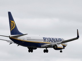 A Ryanair aircraft lands at Manchester Airport in Manchester, north-west England, Britain, May 26, 2015. REUTERS/Andrew Yates