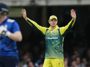 Australia’s Steven Smith directs his players during the One Day International cricket match between England and Australia at Lord's Cricket Ground, London, Saturday, Sept. 5, 2015. (AP Photo/Tim Ireland)