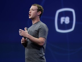 In this March 25, 2015, file photo, CEO Mark Zuckerberg gestures while delivering the keynote address at the Facebook F8 Developer Conference in San Francisco. Zuckerberg said Tuesday, Sept. 15, Facebook may finally be getting a button that lets you quickly express something beyond a "like." (AP Photo/Eric Risberg, File)
