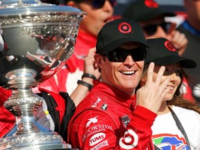 New Zealand’s Scott Dixon, posing with the IndyCar championship trophy late last month at Sonoma Raceway, wants to see his series’ season run from February to October, putting it closer in duration to NASCAR and F-1. (AFP)