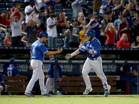 Toronto Blue Jays catcher Russell Martin celebrates against the Atlanta Braves at Turner Field in Atlanta on Sept. 16, 2015. (Jason Getz/USA TODAY Sports)