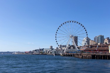 This undated photo provided by Visit Seattle shows Seattle�s Great Wheel. The wheel is one of the city�s newest tourist attractions. (Howard Frisk Photography/Visit Seattle via AP)