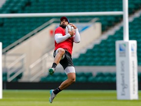 France's Yoann Huget catches the ball during a training session at Twickenham Stadium, London, on Thursday, Sept. 17, 2015. The Rugby World Cup starts Friday. (Christophe Ena/AP Photo)