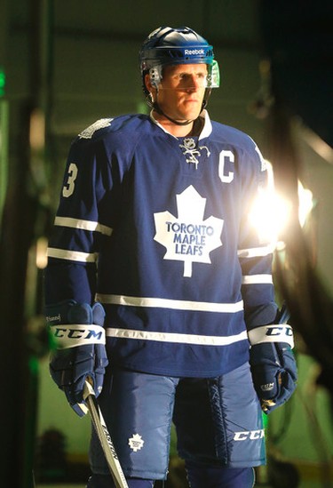 Leafs captain Dion Phaneuf gets some video work done at the opening of Toronto Maple Leafs training camp at the MasterCard Centre iin Toronto on Thursday September 17, 2015. Michael Peake/Toronto Sun/Postmedia Network