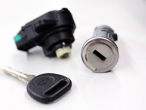 A recalled Chevy Cobalt ignition switch is seen at Raymond Chevrolet in Antioch, Illinois, in this file photo from July 17, 2014. General Motors Co agreed to pay $900 million and admit to misleading the government and the public about the safety of its vehicles to end a U.S. criminal investigation into its handling of defective ignition switches linked to 124 deaths.   REUTERS/John Gress/Files