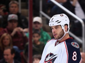 Nathan Horton #8 of the Columbus Blue Jackets awaits a face off against the Phoenix Coyotes during the NHL game at Jobing.com Arena on January 2, 2014 in Glendale, Arizona. (Christian Petersen/Getty Images/AFP)
