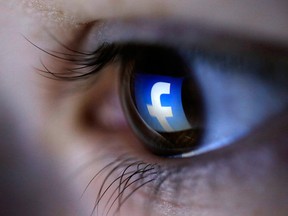 A picture illustration shows a Facebook logo reflected in a person's eye, in Zenica, March 13, 2015. REUTERS/Dado Ruvic