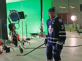 Captain Dion Phaneuf gets some video work done at the opening of Toronto Maple Leafs training camp at the MasterCard Centre iin Toronto on Sept. 17, 2015. (Michael Peake/Toronto Sun/Postmedia Network)