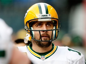Aaron Rodgers of the Green Bay Packers looks at the scoreboard during the fourth quarter of the 2015 NFC Championship game against the Seattle Seahawks at CenturyLink Field on January 18, 2015 in Seattle. (Christian Petersen/Getty Images/AFP)