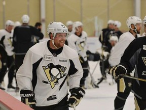 Newcomer Phil Kessel shares a laugh with teammates at Pittsburgh Penguins training camp in Cranberry, Pa., on Sept. 16, 2015. (Penguins.nhl.com)