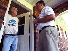 To the right, the candidate MP of Huron-Bruce, Allan Thompson talks with Peter Brommer from Harpurhey. Thompson was campaigning in Seaforth on September 17. (Shaun Gregory/Huron Expositor)