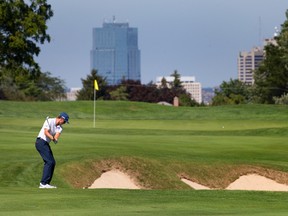 Mackenzie Hughes of Dundas makes an approach shot on the eighth hole during the Freedom 55 Financial Championship in London. (CRAIG GLOVER, The London Free Press)