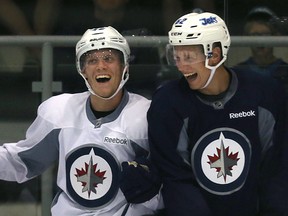 The Jets hope Nikolaj Ehlers (left) is ready to play in the NHL right now. Defenceman Nelson Nogier (right) is a longer term project.