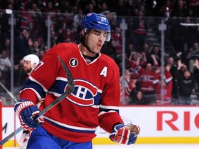 Max Pacioretty #67 of the Montreal Canadiens celebrates after scoring the game winning goal in overtime during the NHL game against the Florida Panthers at the Bell Centre on March 28, 2015 in Montreal, Quebec, Canada. The Canadiens defeated the Panthers 3-2 in overtime.   Richard Wolowicz/Getty Images/AFP
