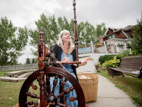 Cathy Eisenmenger spins dog hair into yarn at the Maker’s Market re-opening at the Multicultural Heritage Centre in Stony Plain in August. - Yasmin Mayne, Reporter/Examiner