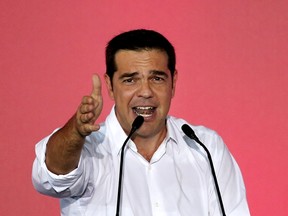 Former Greek prime minister and leader of leftist Syriza party Alexis Tsipras gestures as he delivers a speech during the final campaign rally prior to Sunday's general elections on main Syntagma square in Athens, Greece, September 18, 2015. REUTERS/Alkis Konstantinidis