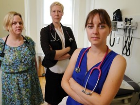 Luke Hendry/The Intelligencer 
Drs. Julie Bryson, left, Nadia Knarr and Rebecca Holmes stand in an exam room at Connor House Family Practice in Belleville Friday. They warn changes in how Ontario compensates doctors will result in doctor shortages.