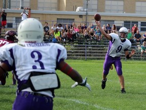 St. Clair Colts quarterback Josh Kita fires a pass to wide receiver Keyshaun Jordan during the senior boy's high school eight-man football game Friday afternoon in Sarnia. The Colts defeated the Wallaceburg Tartans 27-20. (Terry Bridge, Sarnia Observer)