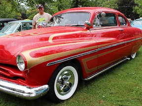 Mike Hudson, 69, stands with his 1951 Mercury Monterey coupe lead sled Saturday at the seventh annual Invade the Close car show and fundraiser in Sarnia, hosted by the Bluewater Austin-Healey Club. Organizers were hoping to raise $5,000 for the Salvation Army. Tyler Kula/Sarnia Observer/Postmedia Network