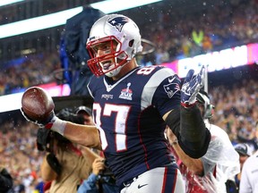 Rob Gronkowski of the New England Patriots celebrates after scoring his third touchdown of the game in the fourth quarter against the Pittsburgh Steelers at Gillette Stadium in Foxboro, Mass., on September 10, 2015. (Maddie Meyer/Getty Images/AFP)