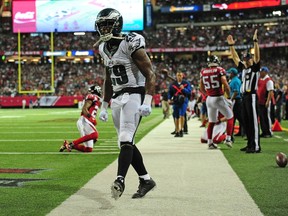 DeMarco Murray of the Philadelphia Eagles celebrates after scoring a third quarter touchdown against Robert Alford of the Atlanta Falcons at the Georgia Dome in Atlanta on Sept. 14, 2015. (Scott Cunningham/Getty Images/AFP)