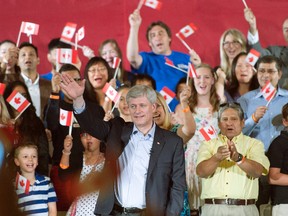 Conservative leader Stephen Harper waves to the crowd during a campaign event in Toronto, Friday, September 18, 2015. THE CANADIAN PRESS/Ryan Remiorz