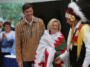 Edmonton Mayor Don Iveson, left, Premier Rachel Notley, centre, and Grand Chief Tony Alexis chat during Treaty no. 6 Recognition Day at City Hall in Edmonton on Friday August 21, 2015. Perry Mah/Edmonton Sun/Postmedia Network