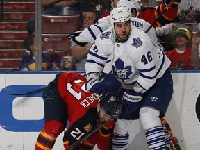 Roman Polak #46 of the Toronto Maple Leafs checks Vincent Trocheck #21 of the Florida Panthers at the BB&T Center on March 3, 2015 in Sunrise, Florida. (Joel Auerbach/Getty Images/AFP)