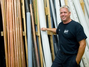 Marty Salliss of Salliss Plumbing and Heating says business spiked after a late June storm hammered London with rain. (MIKE HENSEN, The London Free Press)