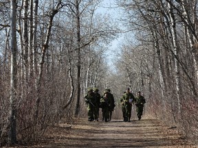 Members of 1 Canadian Mechanized Brigade Group compete in Exercise HERAKLES RAM in Hawrelak Park, in Edmonton Alta., on Wednesday April 15, 2015. David Bloom/Edmonton Sun/Postmedia Network