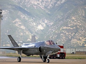 An F-35 jet arrives at it new operational base Wednesday, Sept. 2, 2015, at Hill Air Force Base, in northern Utah.  (AP Photo/Rick Bowmer)