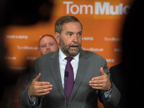 NDP Leader Tom Mulcair fields questions from reporter at a campaign rally in St. John's, N.L., on Sunday, Sept. 20, 2015. THE CANADIAN PRESS/Andrew Vaughan