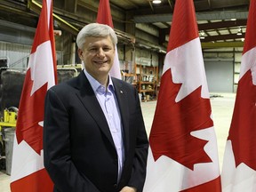 Stephen Harper poses for a photo during a campaign stop in Sarnia Sunday. The Conservative Party leader spoke with The Observer about oil refining and poverty before the campaign event. (Tyler Kula, The Observer)