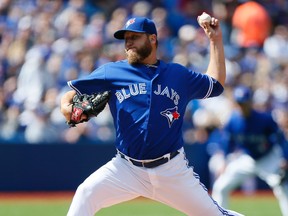Toronto Blue Jays starting pitcher Mark Buehrle (56) throws against the Boston Red Sox in the second inning at Rogers Centre.  John E. Sokolowski-USA TODAY Sports