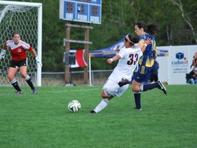 Ottawa Gee-Gees' Pilar Khoury lets off a shot during OUA women's soccer action at the LU soccer fields on Sunday. Ottawa won 4-1. Keith Dempsey/For The Sudbury Star