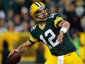 Green Bay Packers' Aaron Rodgers throws long against the Seattle Seahawks during the first half of an NFL football game in Green Bay on Sunday night. (Glasheen/The Post-Crescent via AP)