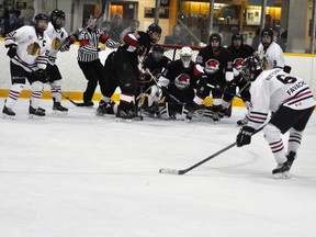 Mitchell Hawks’ defenceman Haydn Favacho (6) prepares to let go a shot at the Walkerton Blackhawks’ net in the dying seconds of their Western Jr. C game in Mitchell last Saturday, but there’s little net to shoot at. He didn’t score, one of many chances the home side had at times in the game in a 2-1 defeat. ANDY BADER/MITCHELL ADVOCATE