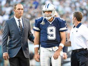Dallas Cowboys quarterback Tony Romo is helped off the field after being sacked against the Philadelphia Eagles during the third quarter at Lincoln Financial Field on Sept. 20, 2015. (Eric Hartline/USA TODAY Sports)