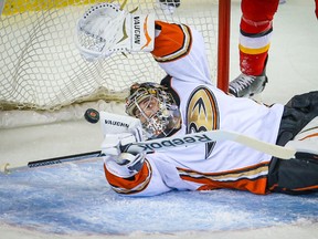 Anaheim Ducks goalie John Gibson reacts after letting in a goal to the Calgary Flames during the first period at Scotiabank Saddledome in Calgary on March 11, 2015. (Sergei Belski/USA TODAY Sports)
