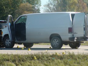 Manitoba's independent investigation unit investigate a scene just north of Winnipeg on Highway 59 near Highway 44. Winnipeg police officers shot and killed a 44-year-old man at the scene. (JIM BENDER/WINNIPEG SUN)
