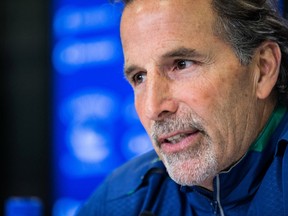 Vancouver Canucks' head coach John Tortorella answers media questions during a news conference in Vancouver April 14, 2014. (Carmine Marinelli/Vancouver 24hours)